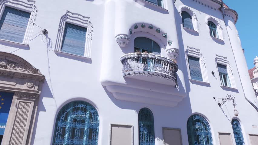 Detailed view of the exterior of Casa de Turta Dulce, a historic building in Timisoara with unique architectural features.