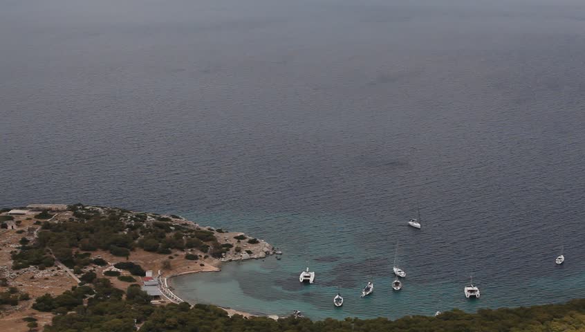 Sailing in the Aegean Sea (HD) Moni island Bay, Greece, top view.