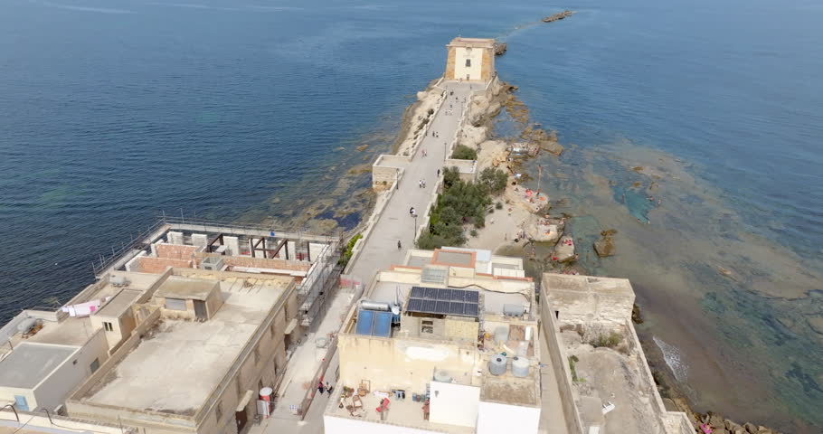 Aerial view of the Ligny Tower, located on the Trapani waterfront. It is an ancient coastal tower located at the western end of the city in Sicily, Italy. Today it is a museum.