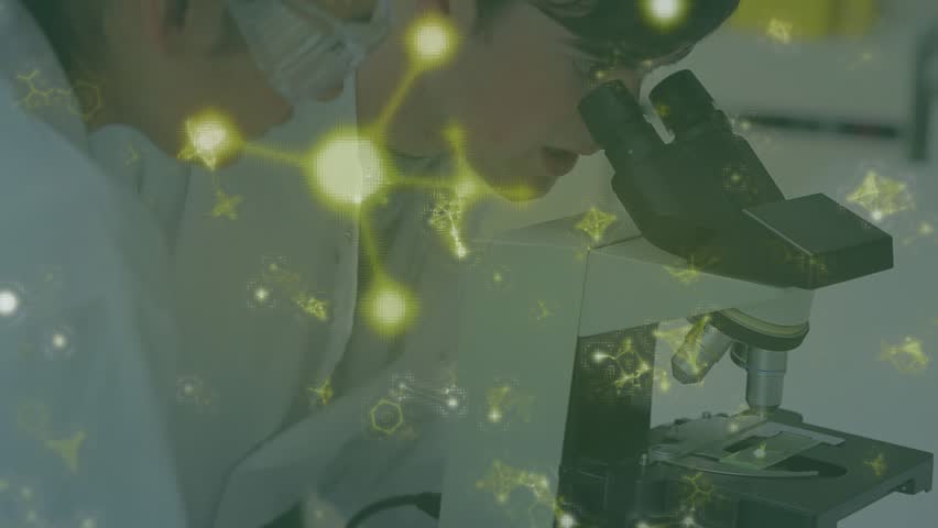 Researcher loading slide and focusing while molecules drifting highlighting cell structures. Scientists, laboratory, microscopy, molecular, discovery, innovation, scientific - Powered by Shutterstock - Get 15% off with code: PIKWIZARD15