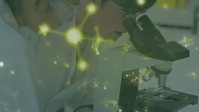 Researcher loading slide and focusing while molecules drifting highlighting cell structures. Scientists, laboratory, microscopy, molecular, discovery, innovation, scientific - Powered by Shutterstock - Get 15% off with code: PIKWIZARD15