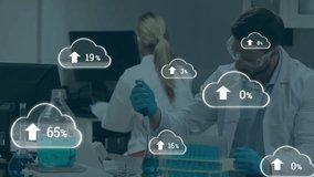 Research scientist pipetting liquid rising upload icons over test tube rack syncing experiment data. Science, collaboration, innovation, analytics, technology, precision, laboratory - Powered by Shutterstock - Get 15% off with code: PIKWIZARD15