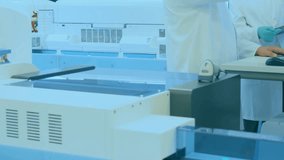 Lab tech moving mouse reviewing data, colleague entering and analyzing animated performance charts. Scientists, collaboration, analytics, technology, research, professional, innovation - Powered by Shutterstock - Get 15% off with code: PIKWIZARD15