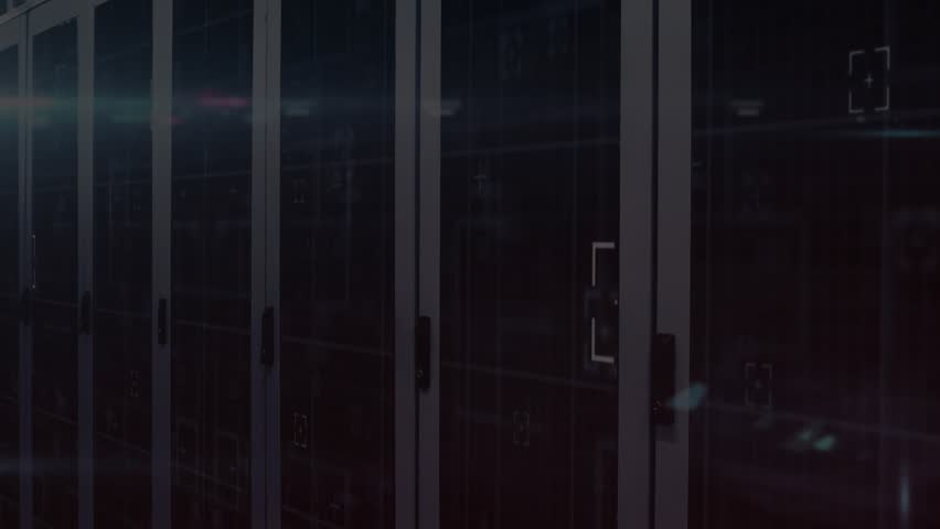 Binary code materializing before server cabinets, cascading downward, densifying to show data flow. Cybersecurity, data, technology, digital, network, industry, encryption - Powered by Shutterstock - Get 15% off with code: PIKWIZARD15