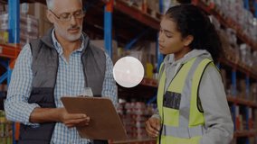 Coworkers checking clipboard in warehouse watching user icons forming network showing connectivity. Professional, collaboration, digital, technology, industrial, communication, data - Powered by Shutterstock - Get 15% off with code: PIKWIZARD15