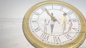Family walking toward surf starting animated watch hands sweeping across gold dial technology demo. Nostalgia, unity, timelessness, serenity, leisure, cohesion, harmony - Powered by Shutterstock - Get 15% off with code: PIKWIZARD15