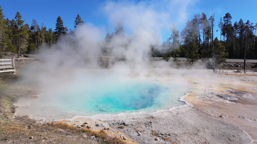 Steam rises from Silex Hot Spring in Yellowstone