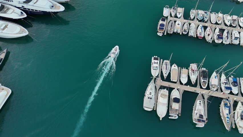 Harbour with luxury yachts in Nice, France. Aerial view of French Riviera, a French resort in Nice. Drone view of sunset in Nice