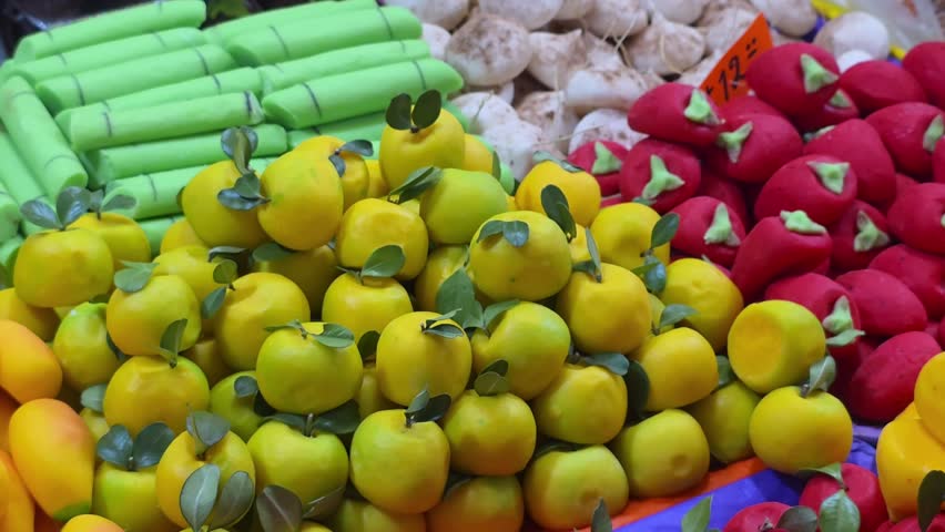 Colorful Offering Decoration: Traditional Mexican Fruit-Shaped Candies for the Day of the Dead Festival
