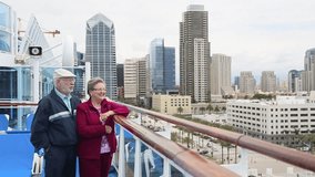 Senior Couple Enjoying the San Diego, California Skyline From the Deck of a Cruise Ship. - Powered by Shutterstock - Get 15% off with code: PIKWIZARD15