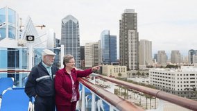 Senior Couple Enjoying the San Diego, California Skyline From the Deck of a Cruise Ship. - Powered by Shutterstock - Get 15% off with code: PIKWIZARD15