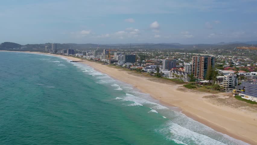 Aerial views of Palm Beach on the Gold Coast with skyline in the background, Queensland, Australia 