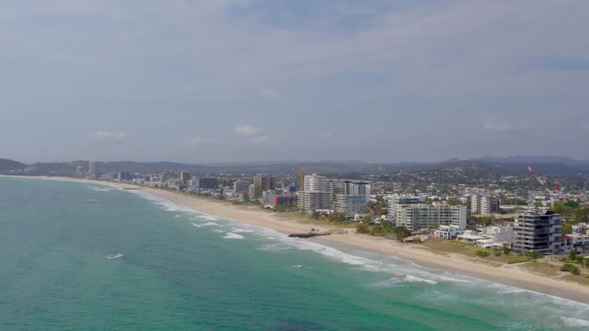 Aerial views of Palm Beach on the Gold Coast with skyline in the background, Queensland, Australia 