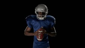 Player walking holding football fixing helmet as FileENCRYPTION code panels emerging for security. Athlete, digital interface, cybersecurity, technology, motion, futuristic, sportsmanship - Powered by Shutterstock - Get 15% off with code: PIKWIZARD15