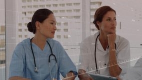 Four medical staff leaning around tablet after tap, reviewing patient data via animated red lines. Collaboration, healthcare, analysis, teamwork, technology, medical, diagnostics - Powered by Shutterstock - Get 15% off with code: PIKWIZARD15