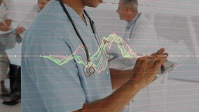 Clinician tapping tablet and reviewing patient vital signs in medical meeting with waveform overlay. Medical, technology, professional, diagnostic, innovation, collaboration, healthcare - Powered by Shutterstock - Get 15% off with code: PIKWIZARD15