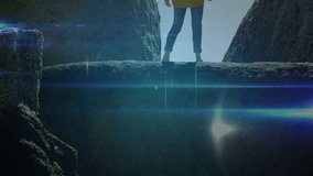 woman standing on rock ledge gazing gap, visualizing data network forming over canyon. Technology, connectivity, innovation, digital, futuristic, nature, urban - Powered by Shutterstock - Get 15% off with code: PIKWIZARD15