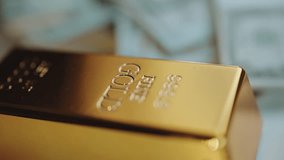 Shiny pure gold bar weighing one kilogram rotating in a macro close-up, revealing its engraved details and smooth, reflective surface, symbolizing wealth, investment, and financial security - Powered by Shutterstock - Get 15% off with code: PIKWIZARD15