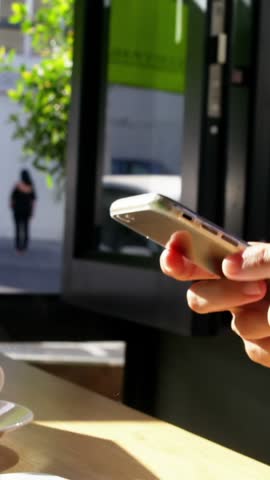 Animation of social media icons falling over person using laptop. Social media and communication concept digitally generated video.