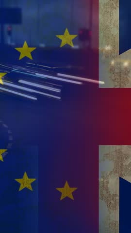 Headlights of car in urban area against animated EU and Britan flag