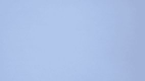 Slow Motion Pouring of Brown Peeled Peanuts Rolling on a White Background - Powered by Shutterstock - Get 15% off with code: PIKWIZARD15