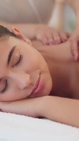 Woman, sleep and massage back at spa for stress relief, muscle healing and luxury skincare. Person, masseuse and pamper with body therapy, tension treatment and soothing session for customer wellness