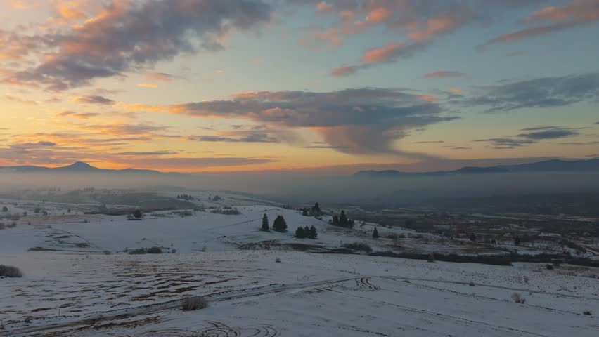 4k Aerial view of Toplița at sunset - Romania winter 02o