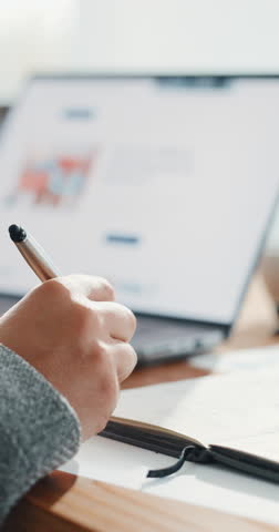 Hands, notes or person in office with laptop, research or brainstorming for campaign promo. Digital, writing or creative director in agency with tech, planning or marketing analysis for brand growth.