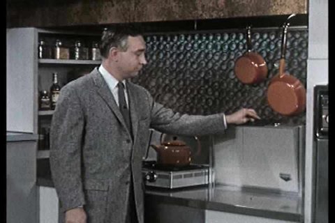 1950s - A couple is given a tour of an amazing new modern kitchen in 1959.