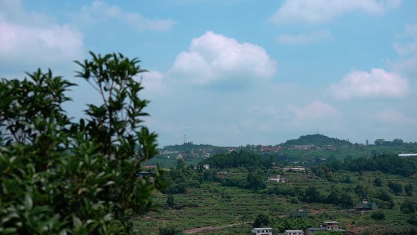 Deep within the mountains under the blue sky and white clouds