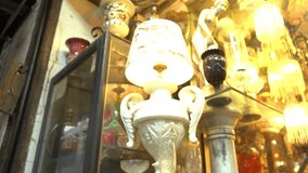 Vintage table lamp shade at flea market, India - Powered by Shutterstock - Get 15% off with code: PIKWIZARD15