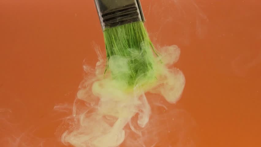 Close-up of Paint Brush in Water Mixed with Green Paint Against Orange Background in 4K Ultra HD — Artistic Concept Showing Creative Process, Vivid Color Contrast, and Modern Art Design - Powered by Shutterstock - Get 15% off with code: PIKWIZARD15