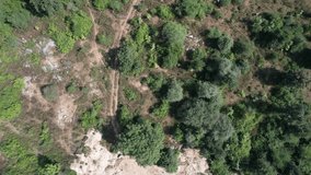 Drone aerial view of a water conservation pond in rural Madhya Pradesh, India, showcasing sustainable water management, environmental balance, and eco-friendly rural development efforts. - Powered by Shutterstock - Get 15% off with code: PIKWIZARD15