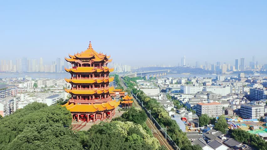 Yellow crane tower overlooking wuhan cityscape on a clear day in hubei province