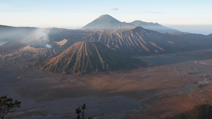 Watching the sunrise at Mount Bromo on Java Island, Indonesia, showcasing the breathtaking volcanic landscape and natural beauty of one of Indonesia’s most iconic travel destinations.