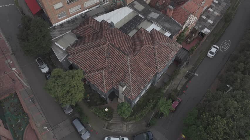 Bogotá, Colombia – May 31, 2025: Areal footage of a house in residential area. Beautiful building, high rise perspective