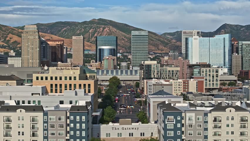 Aerial forward shot over Karl Malone Dr Street in Salt Lake City Downtown