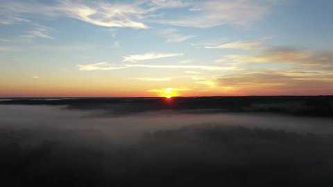 Aerial Foggy Flight over Forest Fields in Novovolkovo
