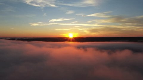 Drone Descending through Morning Fog