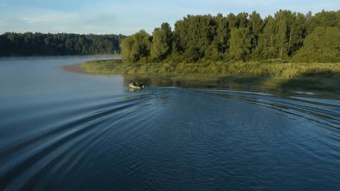 Aerial Drone Following a Speedboat on a Lake