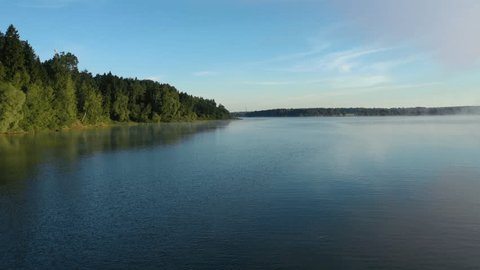 Low Altitude Drone Flight above Calm River