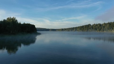 Aerial Drone Flight above Misty Morning River
