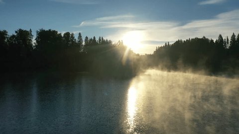 Aerial Drone Flight above Misty Morning River