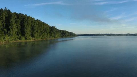 Aerial Drone Flight along Riverbank
