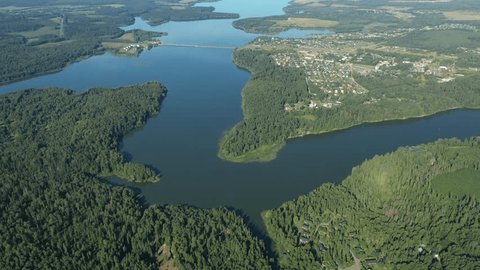Aerial Drone Descent Over River Bend at Sunrise