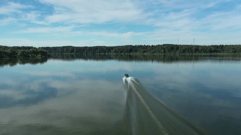 Aerial View of Motorboat on Calm River