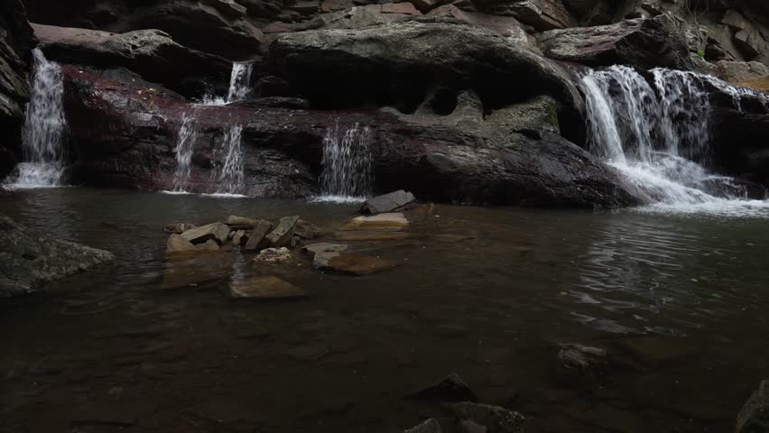 Waterfall in tropical forest at Sukhothai, Nature landscape of Thailand.