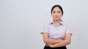 Confident Female Professional with Arms Crossed in Business Attire Standing Against Light Background - Powered by Shutterstock - Get 15% off with code: PIKWIZARD15