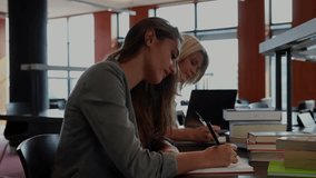 Students studying at library while translucent red overlay sliding in, code scrolling verifying ID. Collaboration, education, technology, coding, cybersecurity, concentration, learning - Powered by Shutterstock - Get 15% off with code: PIKWIZARD15