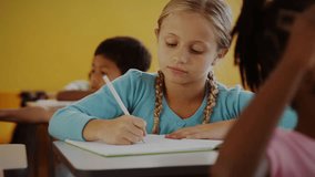 Girl studying in classroom, activating numeric overlays swirling then receding before smiling. Education, learning, creativity, focus, concentration, innovation, technology - Powered by Shutterstock - Get 15% off with code: PIKWIZARD15